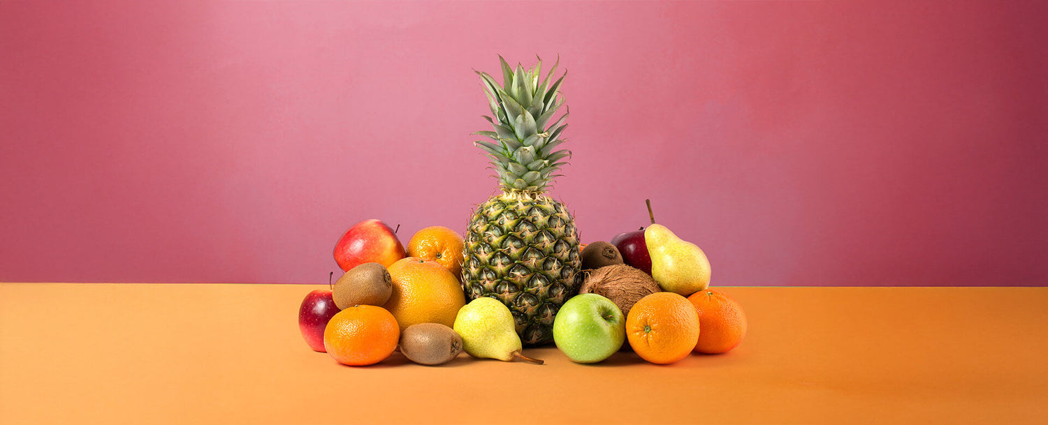 fresh fruit on red and orange background