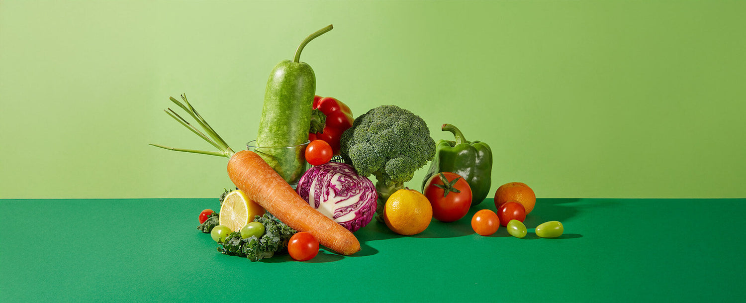fresh vegetables on green background